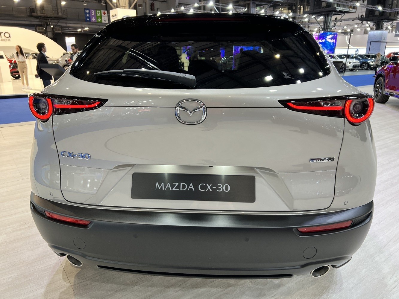 Sleek rear with LED tail lights and dual exhaust pipes