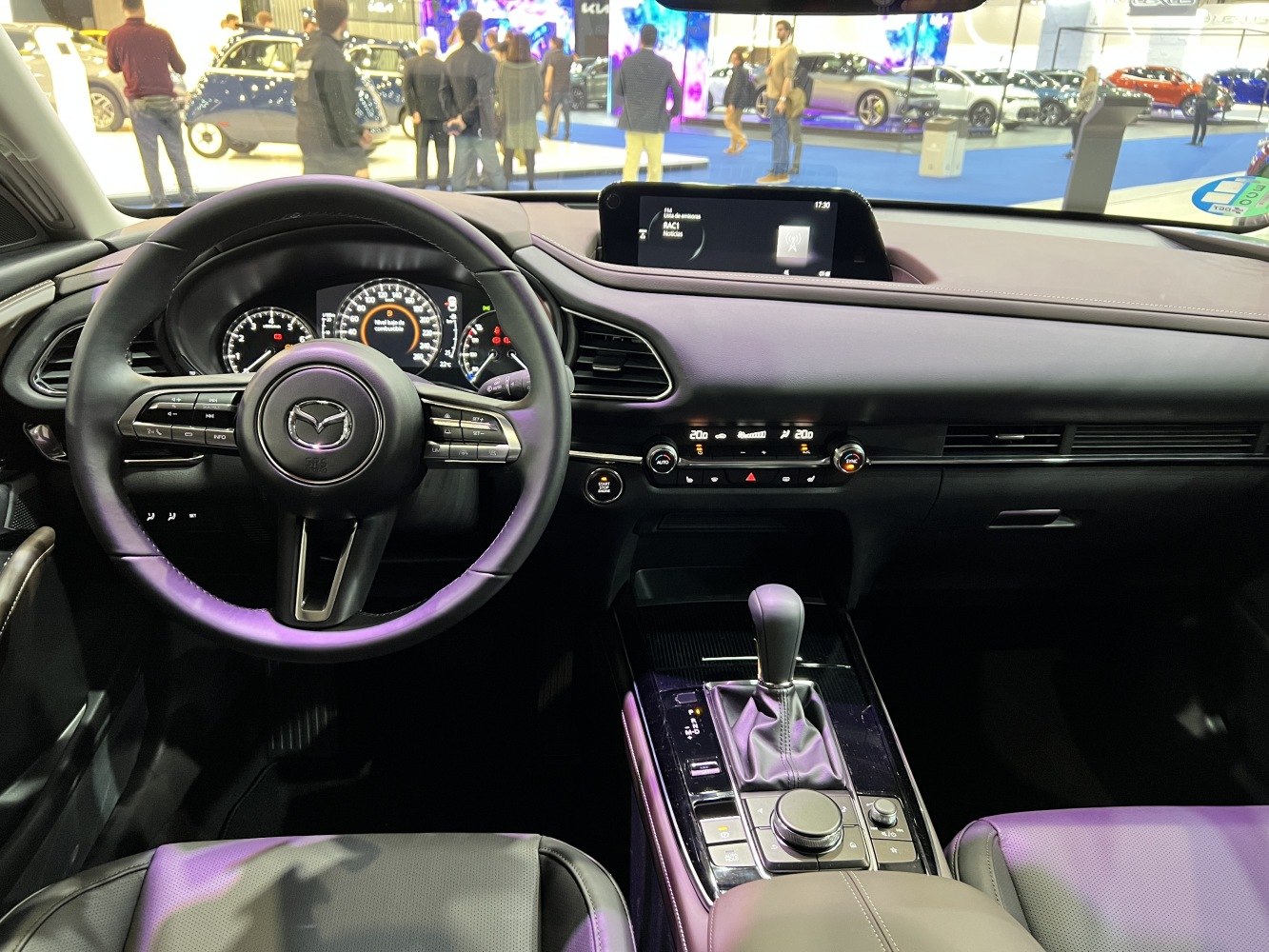 Interior dashboard and center console with steering wheel and infotainment screen