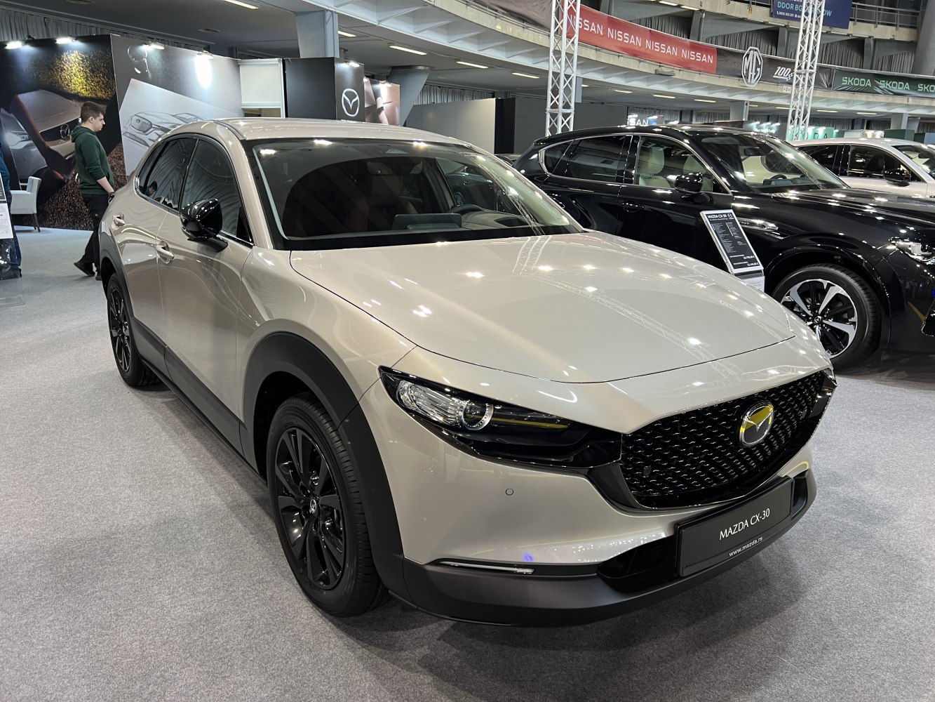 Front view with black grille and LED headlights