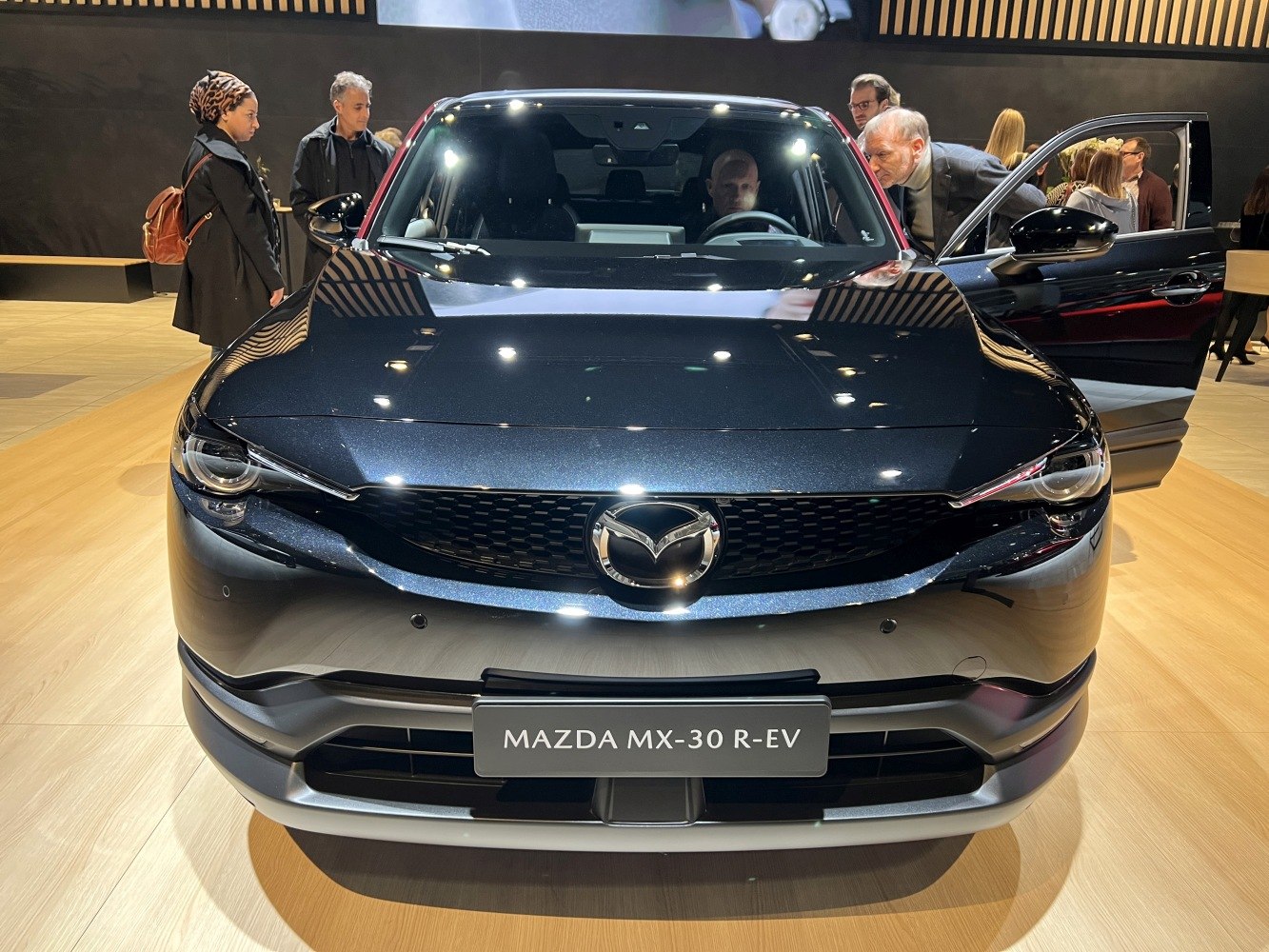 Front view with prominent grille and LED headlights