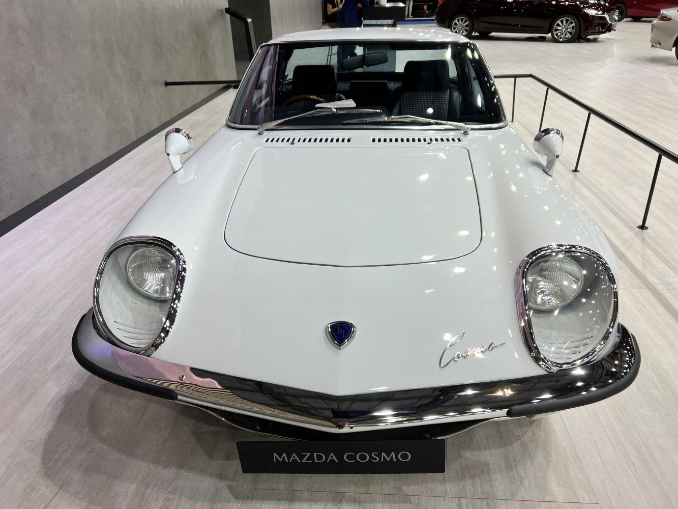 Front view with round headlights and chrome bumper