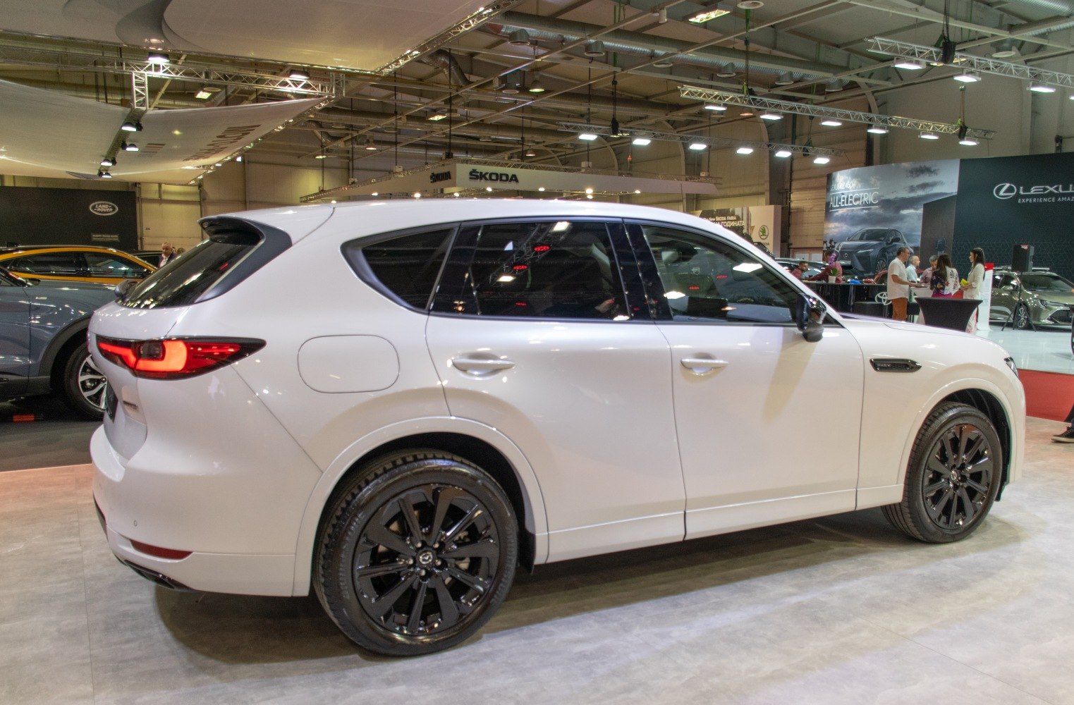 White SUV side view with black alloy wheels and LED rear lights