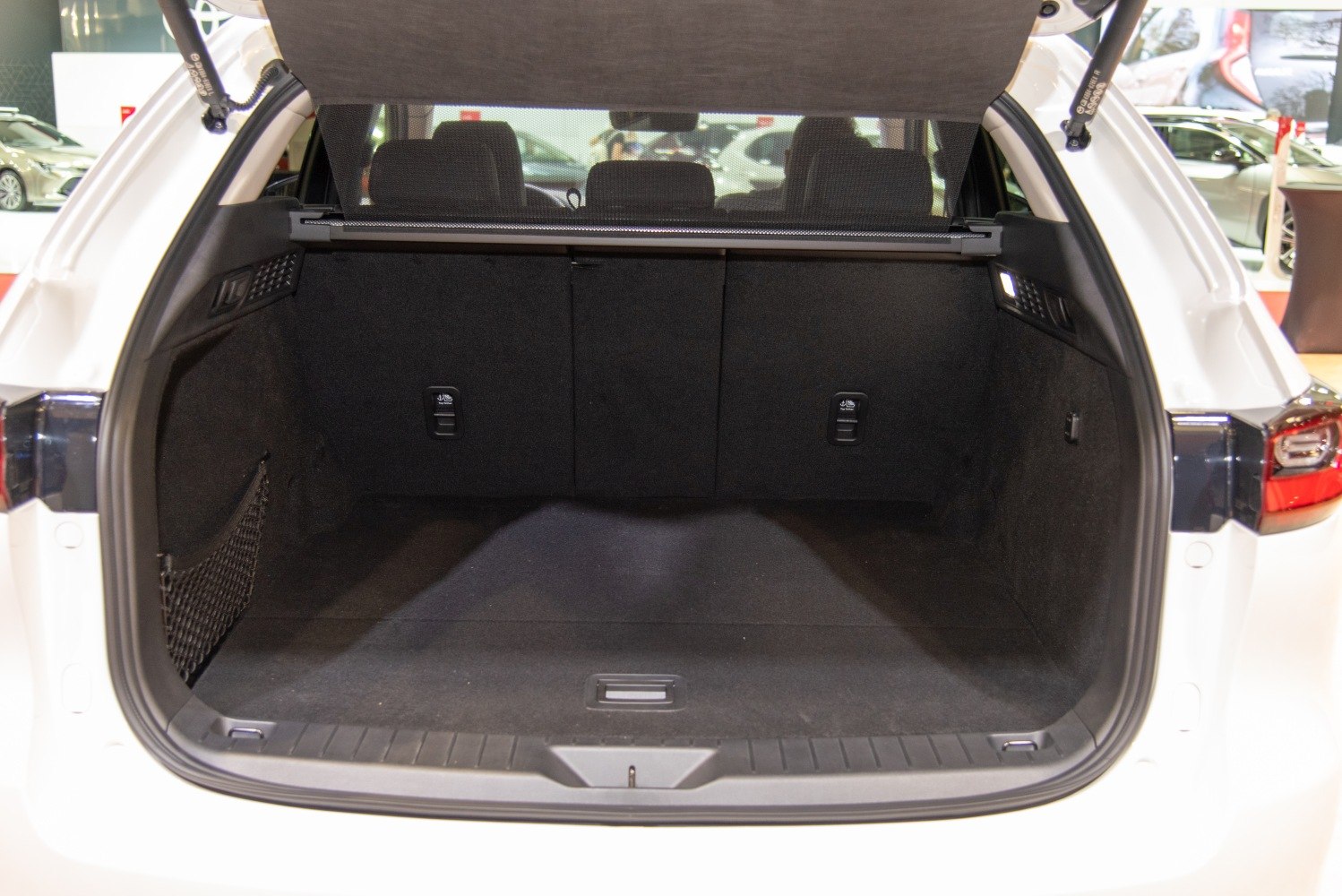 Large, spacious car cargo trunk interior with foldable rear seats