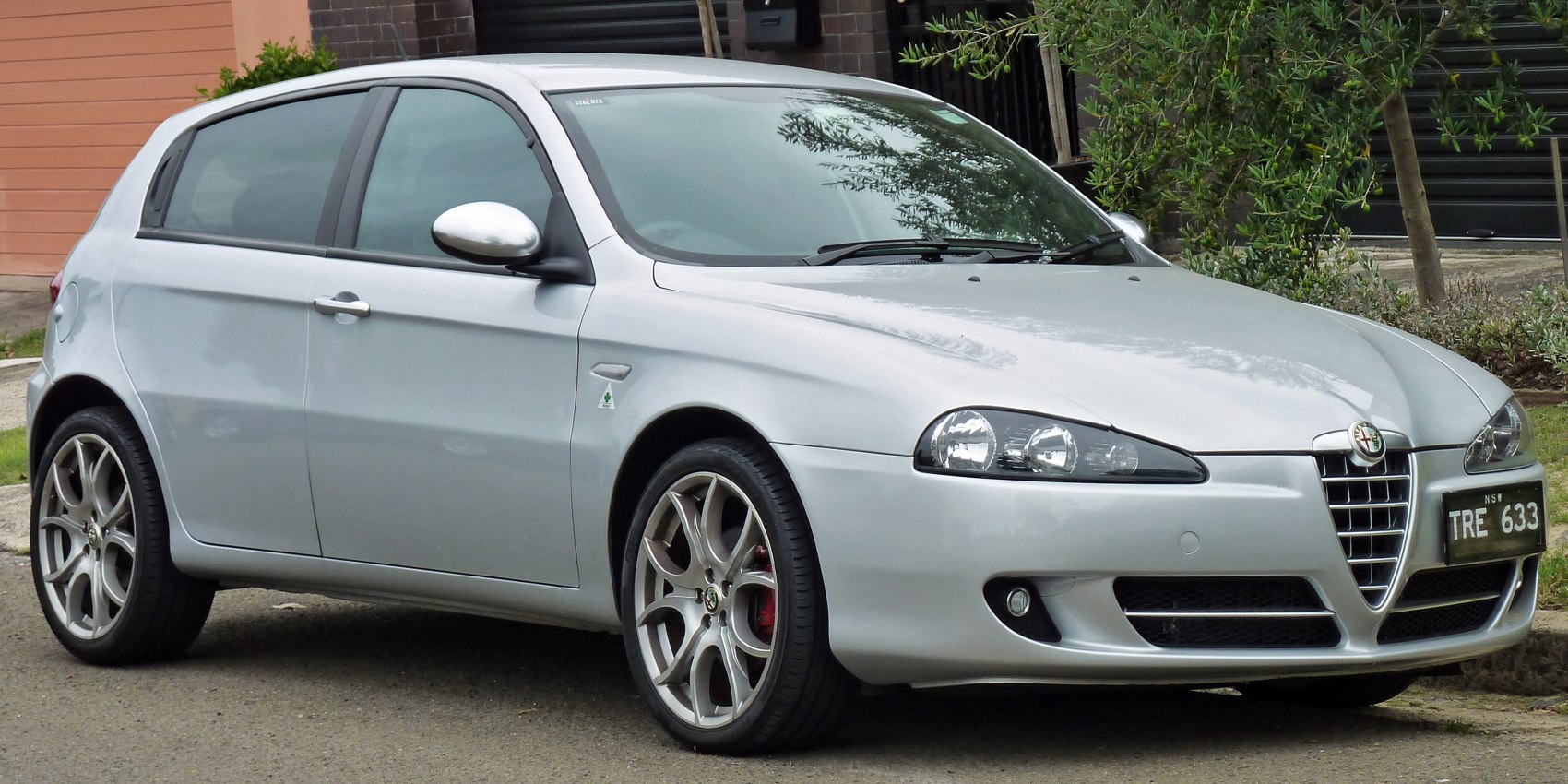 Silver 5-door hatchback with distinctive front grille and alloy wheels