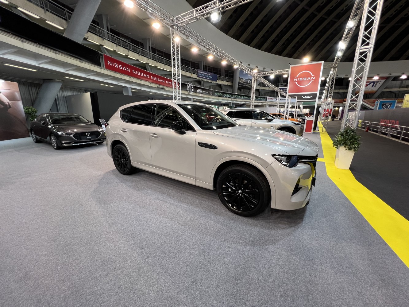 White SUV with black alloy wheels and sleek LED headlights