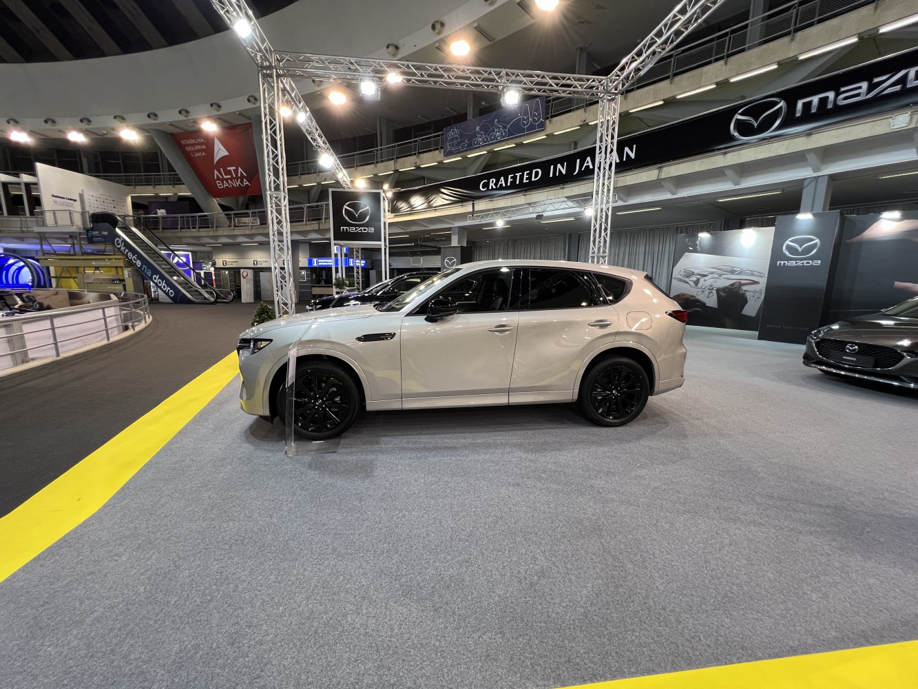 Side profile of a 2022 SUV with black alloy wheels