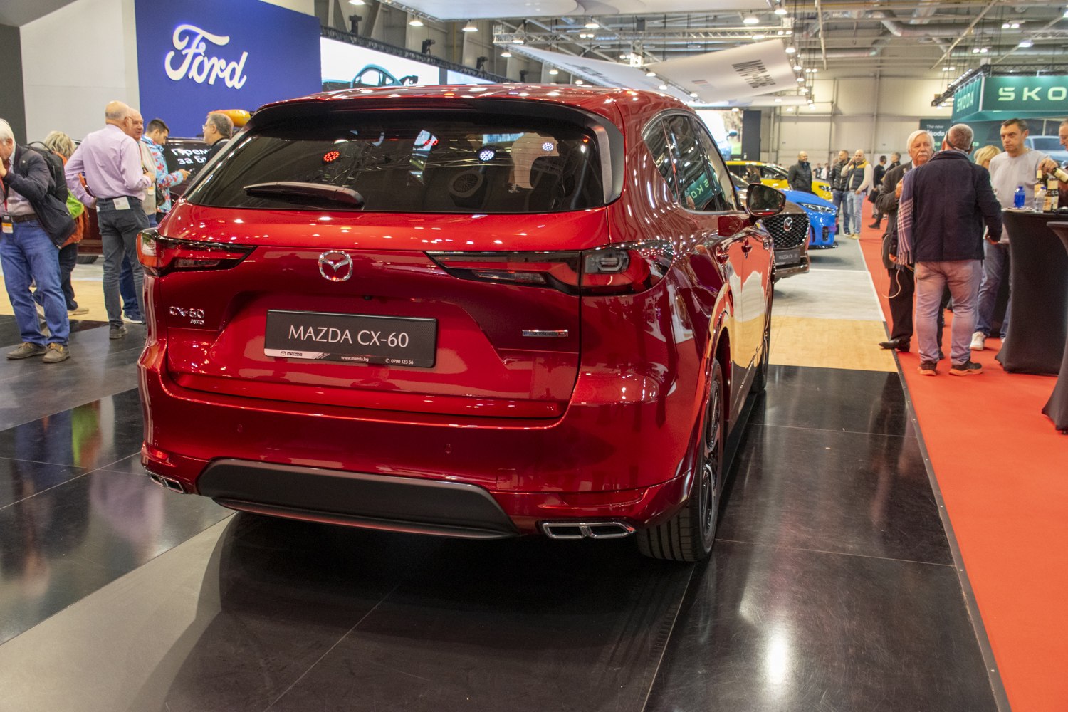 Rear view of SUV featuring sleek tail lights and dual exhaust tips