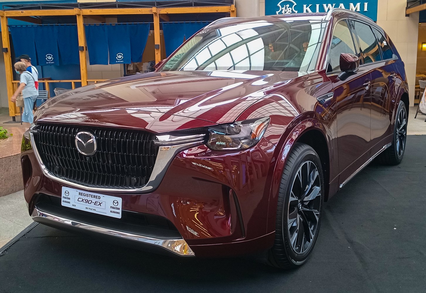 Front grille and headlight design with burgundy paint finish