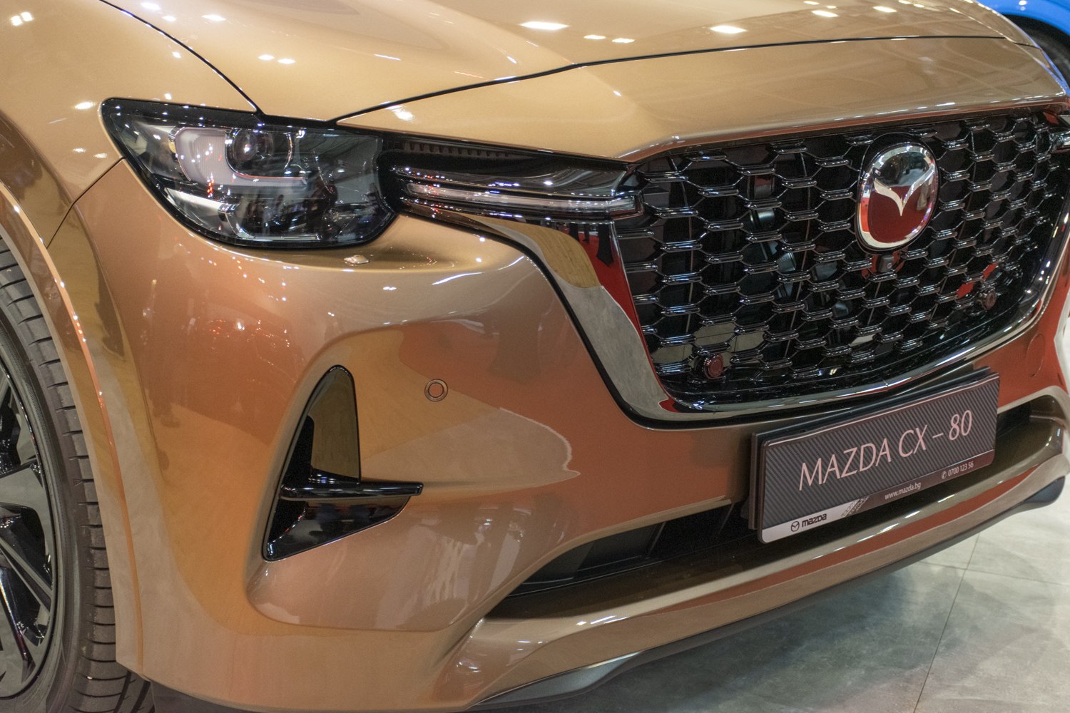 Close-up of front grille and headlight of modern SUV