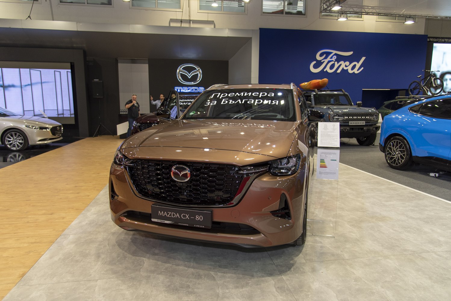 Front view of a 2024 SUV with LED headlights and black grille