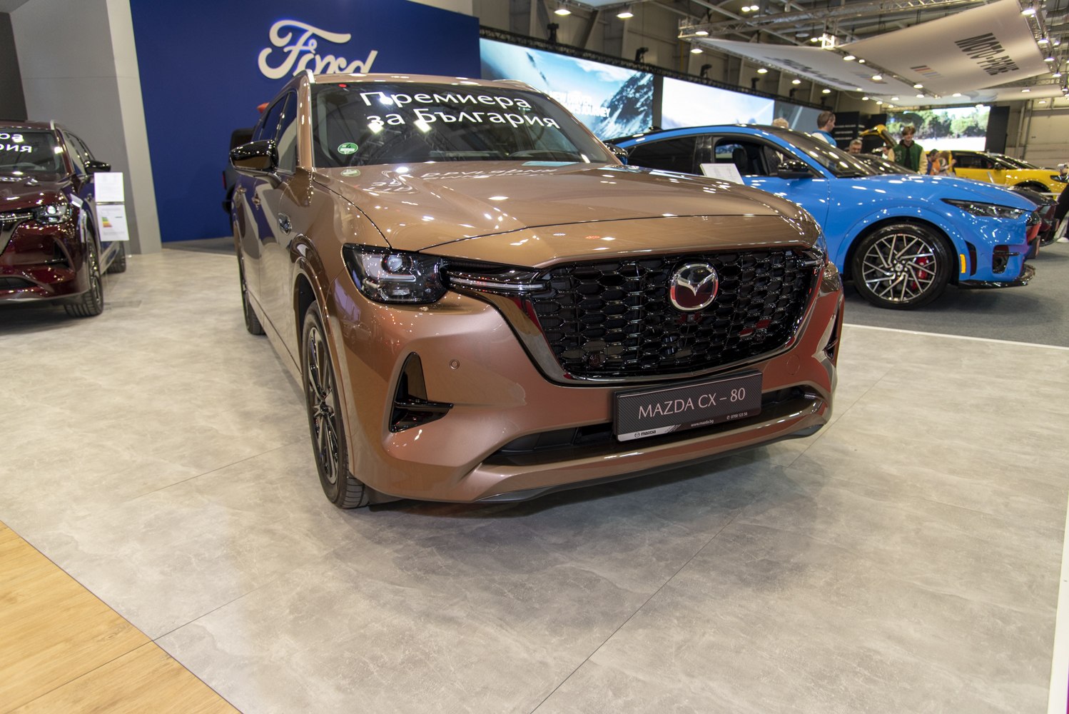 Bold black honeycomb grille and sleek LED headlights on SUV front