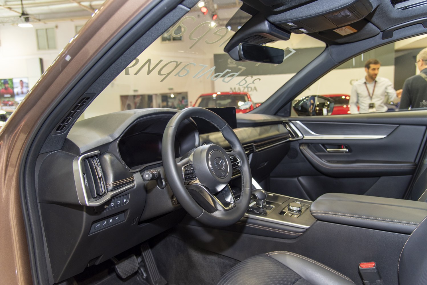 Steering wheel, dashboard, and center console inside a vehicle