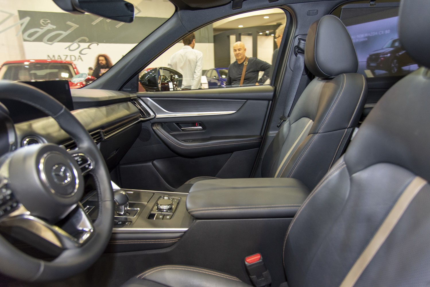 Modern car interior with leather seats and central control panel