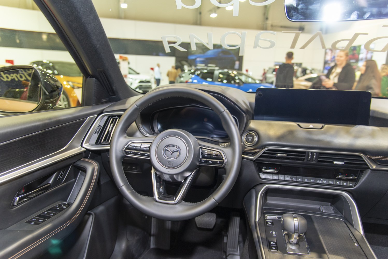 Modern interior with multifunction steering wheel and digital dashboard