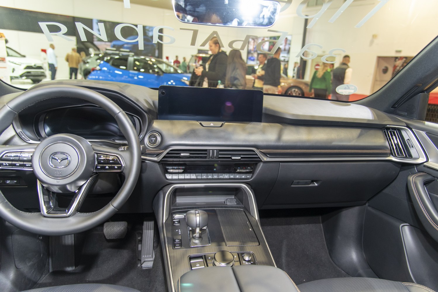 Dashboard and steering wheel with center console controls