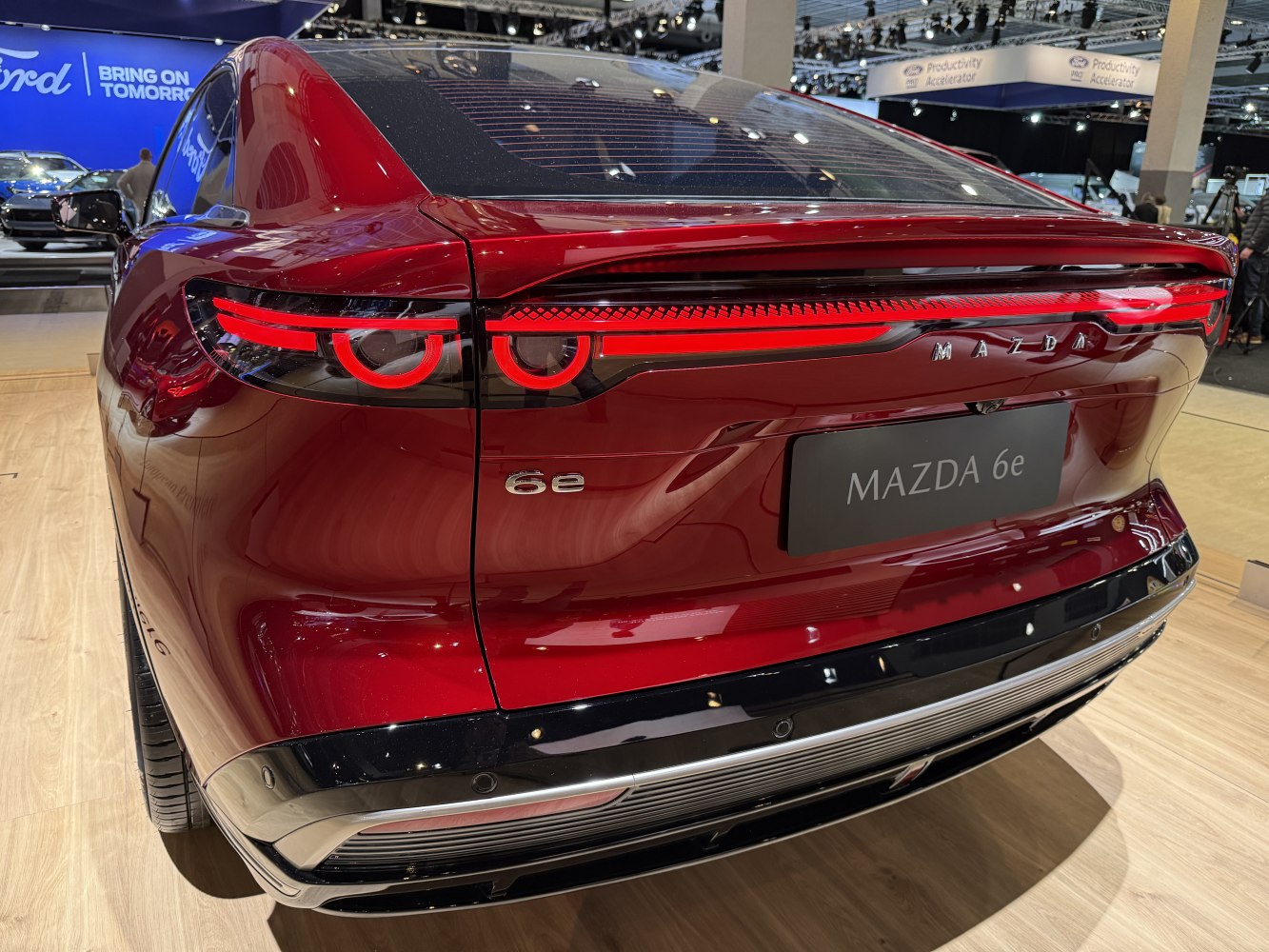 Sleek rear design with distinctive LED tail lights and integrated spoiler