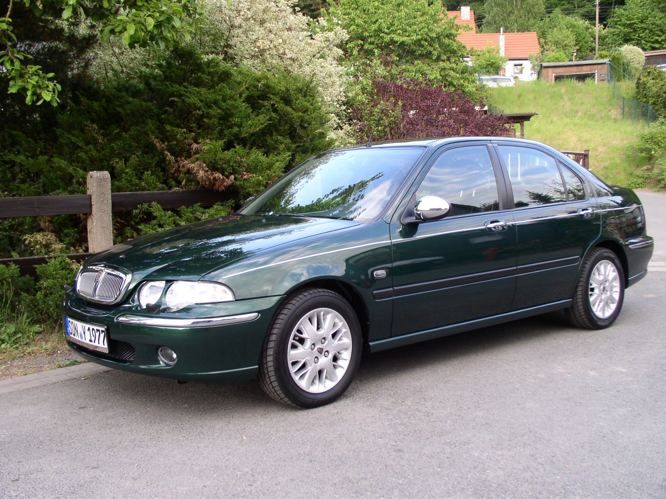 Sedan with alloy wheels and chrome front grille