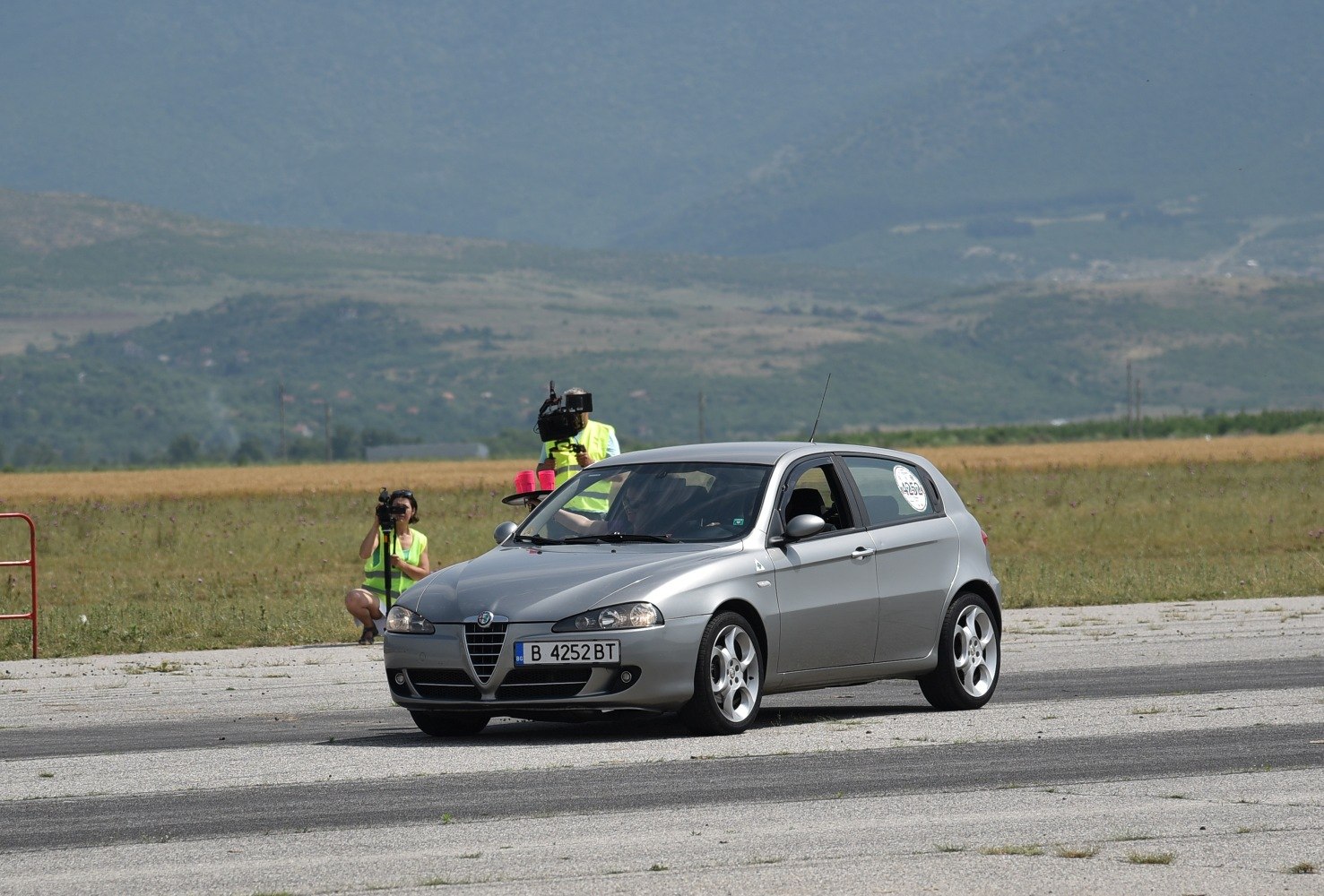 Silver 5-door hatchback with signature grille and alloy wheels