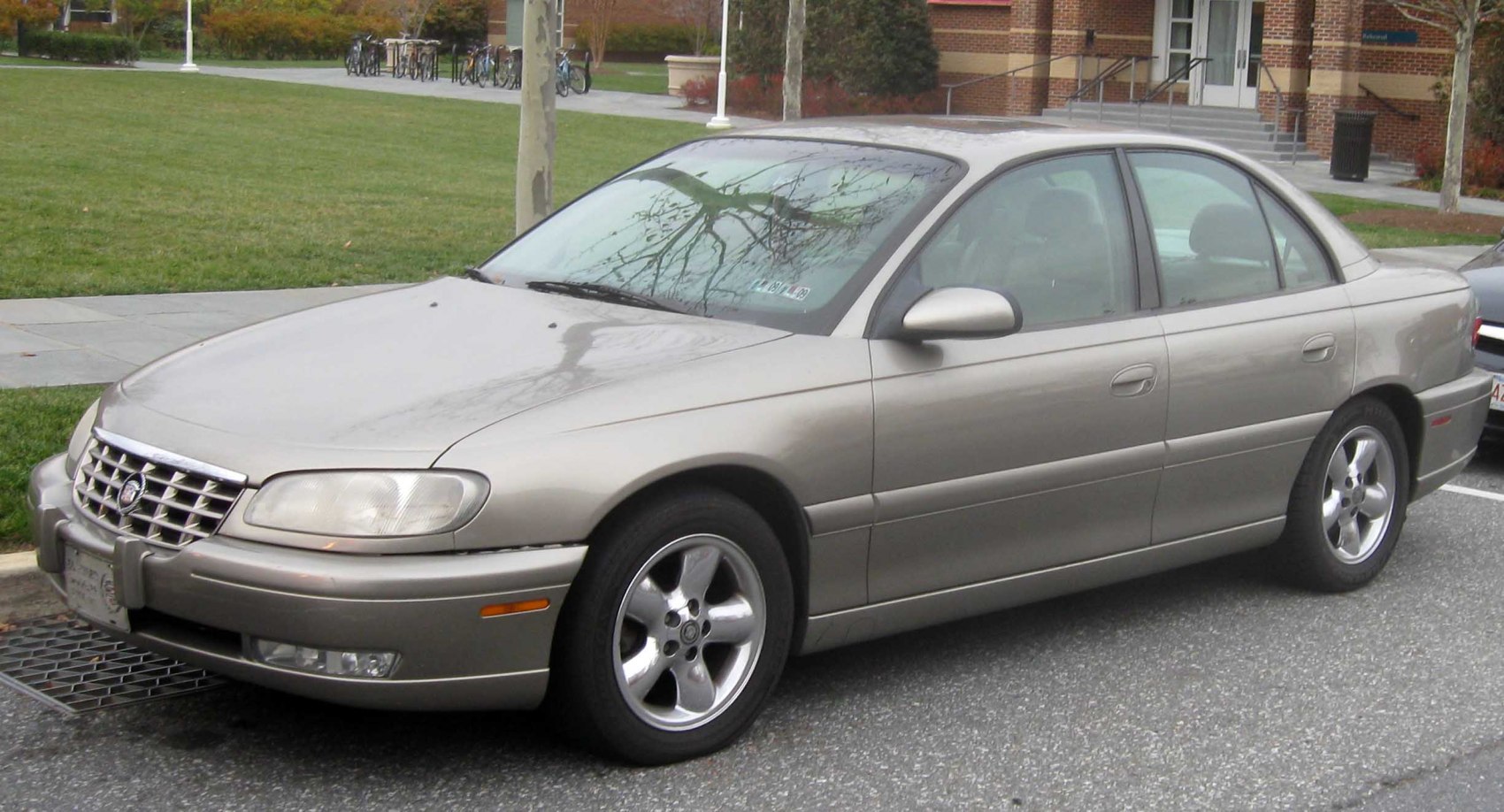 Front-side view showing grille and alloy wheels
