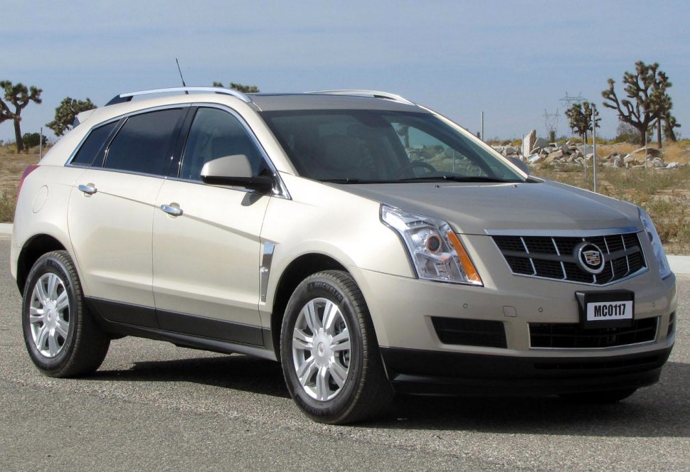 Mid-size luxury SUV with chrome grille and angular headlights