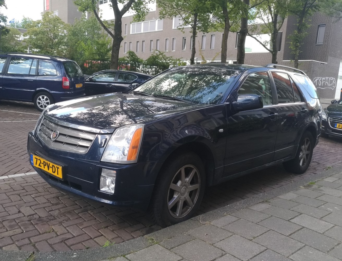 Front view of SUV with bold grille and angular headlights