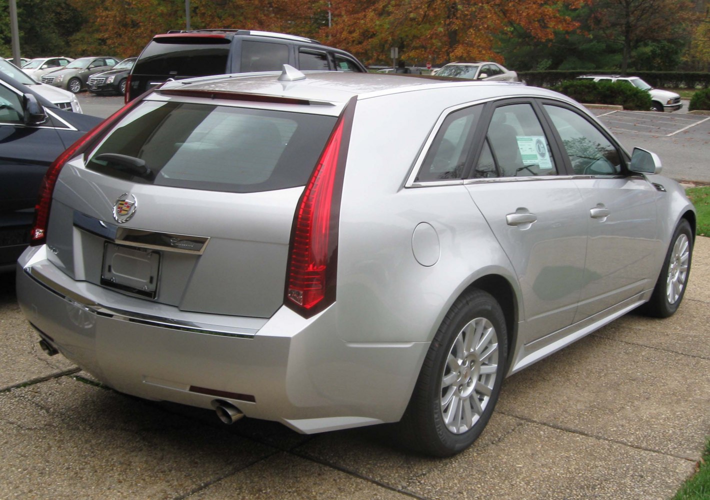 Silver sport wagon rear with vertical taillights and dual exhaust