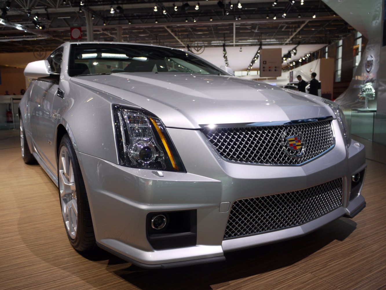 Front grille and sharp LED headlights with sporty fog lights in showroom