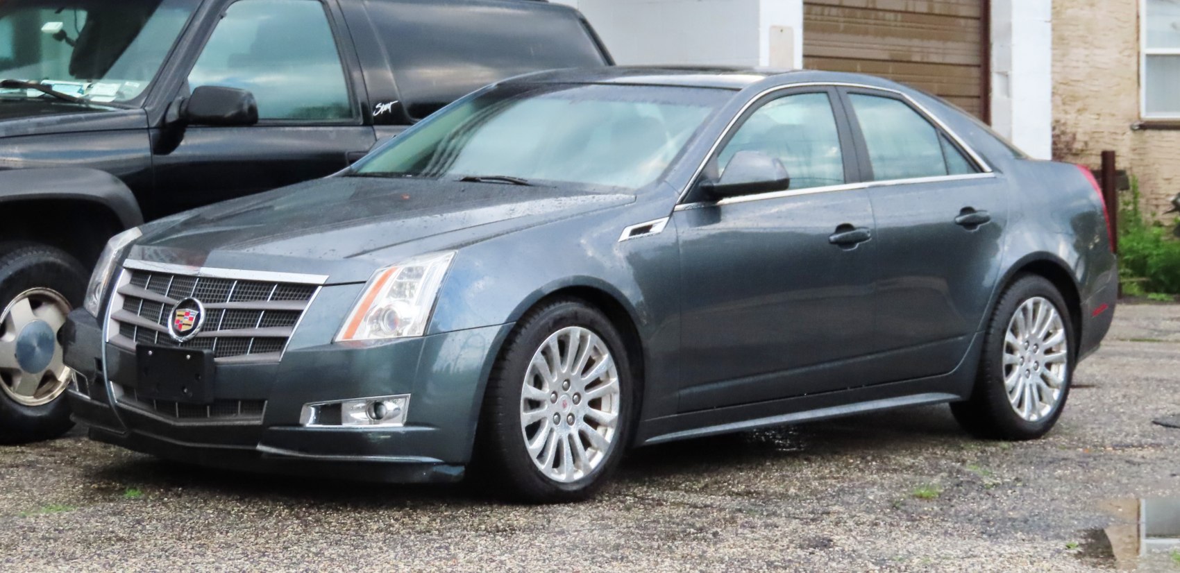 Luxury sedan with distinctive grille and alloy wheels