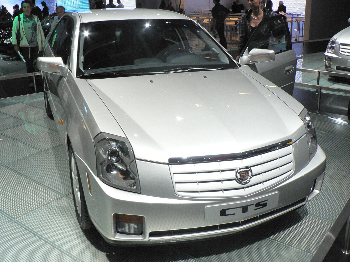 Front grille and headlight design of a luxury sedan.
