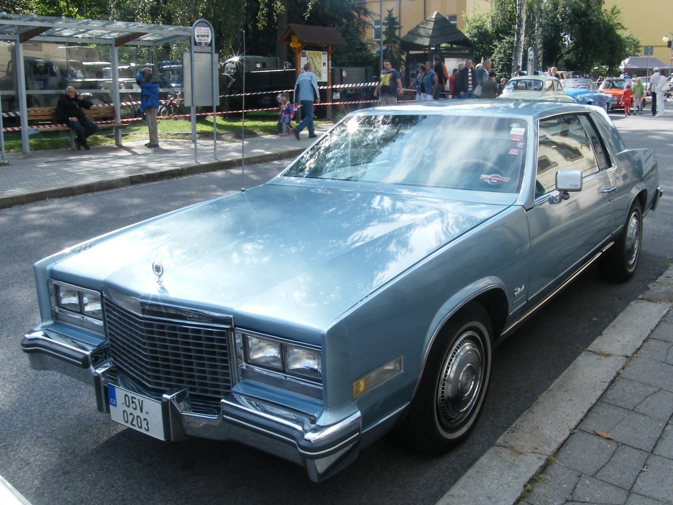 Rectangular front grille and quad square headlamps on a classic 4-door sedan