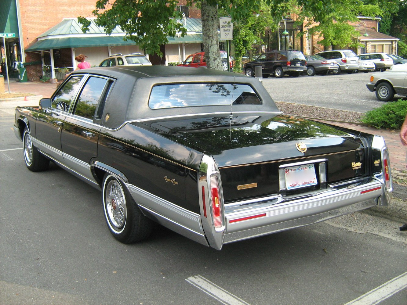 Rear view of a classic sedan with vinyl roof and chrome trim