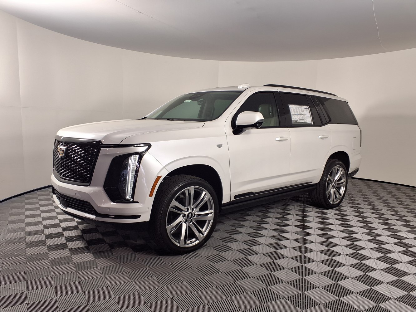 Full-size luxury SUV with LED headlights and chrome multi-spoke wheels