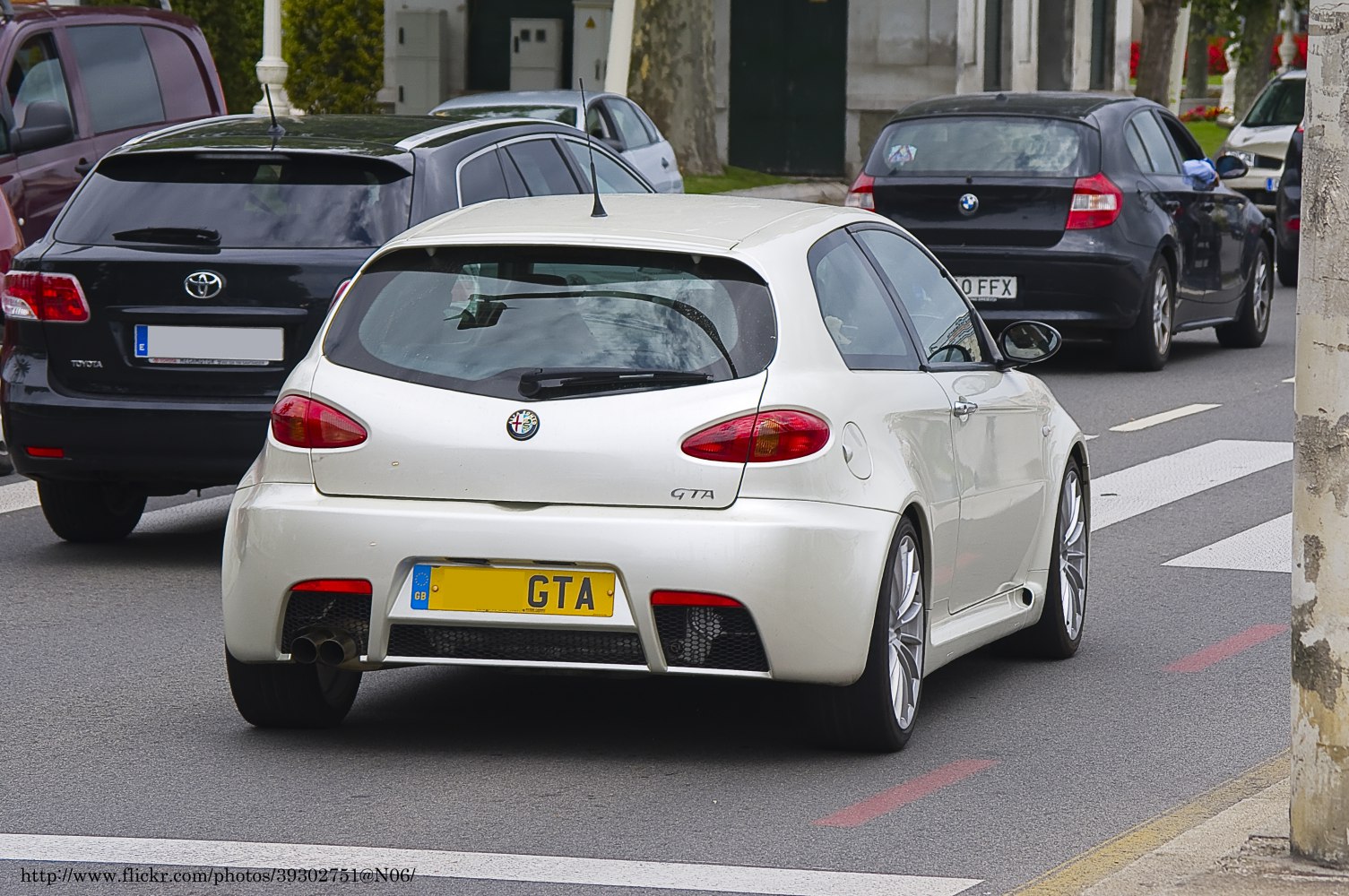 Sporty rear design with dual exhausts and GTA badge on hatchback