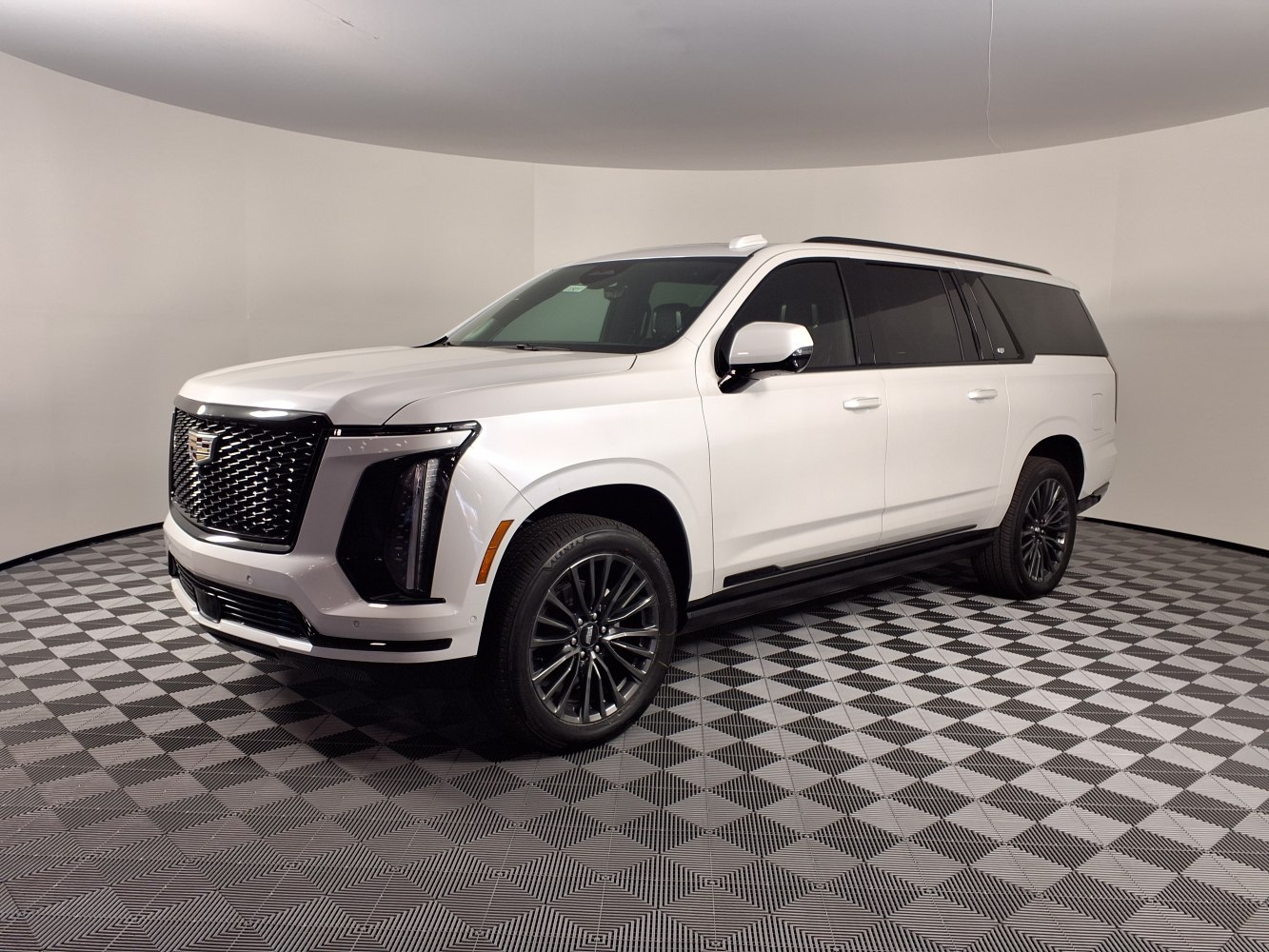 SUV with black grille and vertical LED headlights in white finish