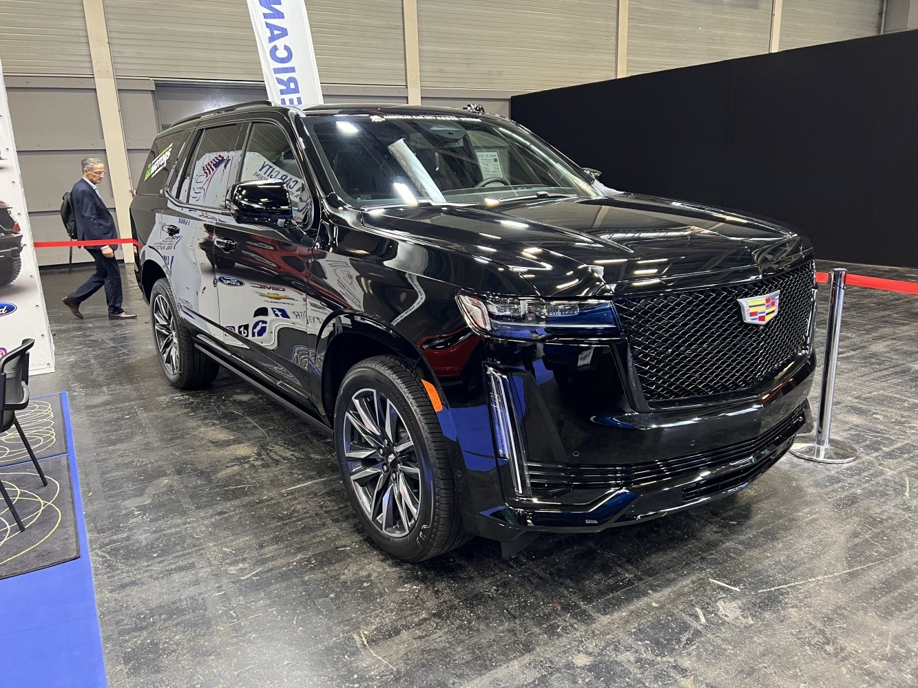 Luxury SUV with bold mesh grille and vertical LED daytime running lights