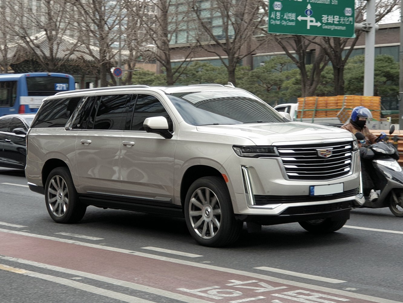Luxury full-size SUV with vertical LED daytime running lights and large multi-bar grille