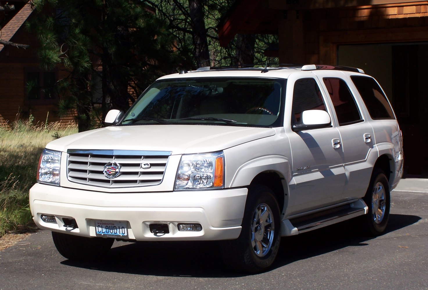 Luxury full-size SUV front with distinctive grille and headlights