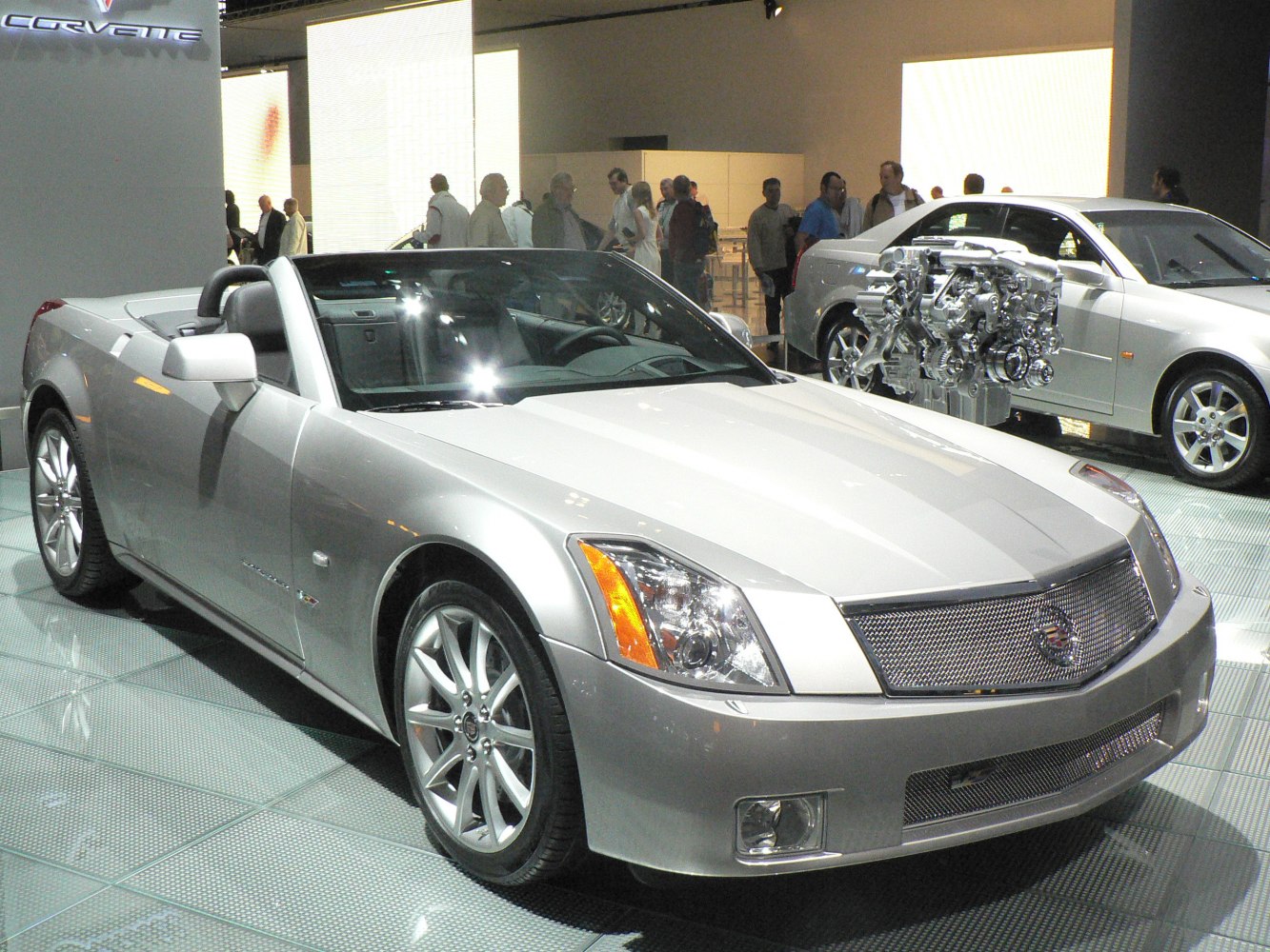 Silver convertible with premium wheels and sleek luxury roadster design