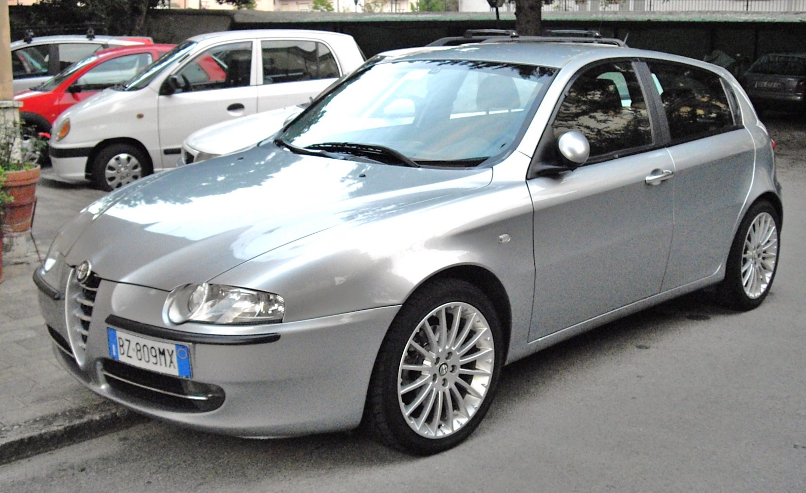 Silver 5-door hatchback with multi-spoke alloy wheels