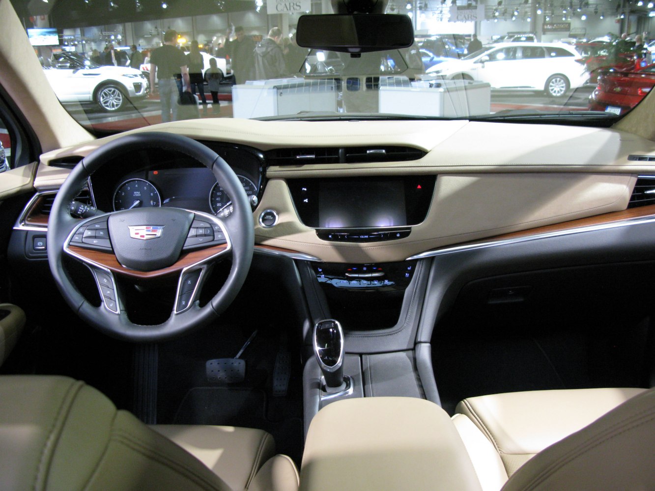 Multifunction steering wheel and touchscreen dashboard with wood trim