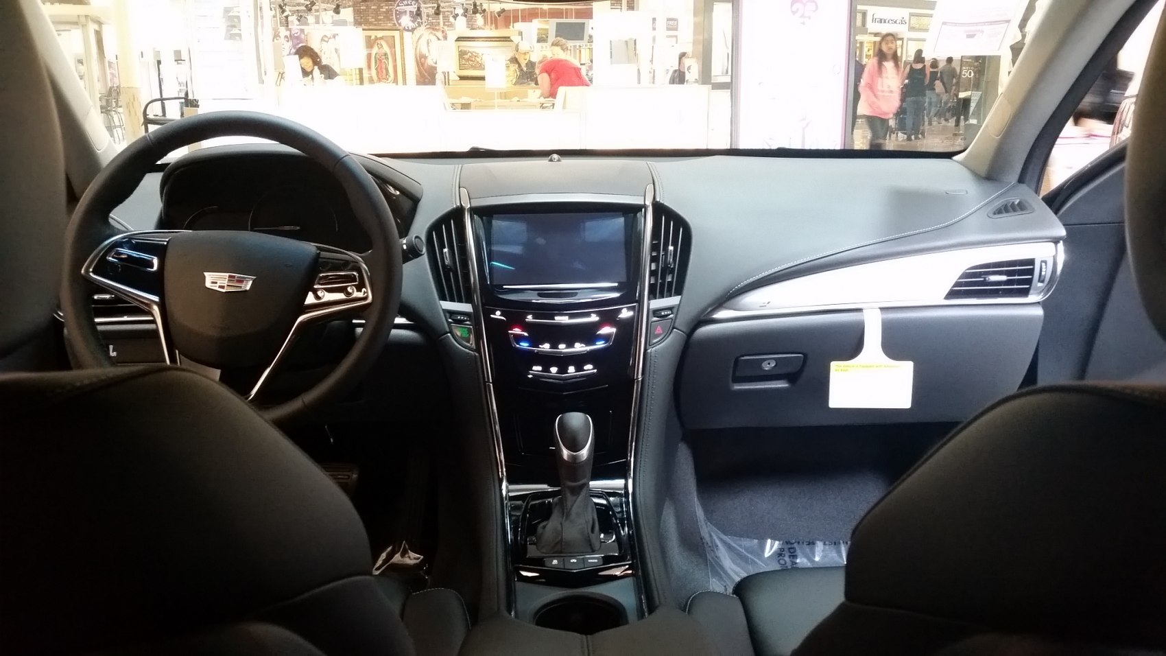 Interior dashboard and steering wheel with center console controls