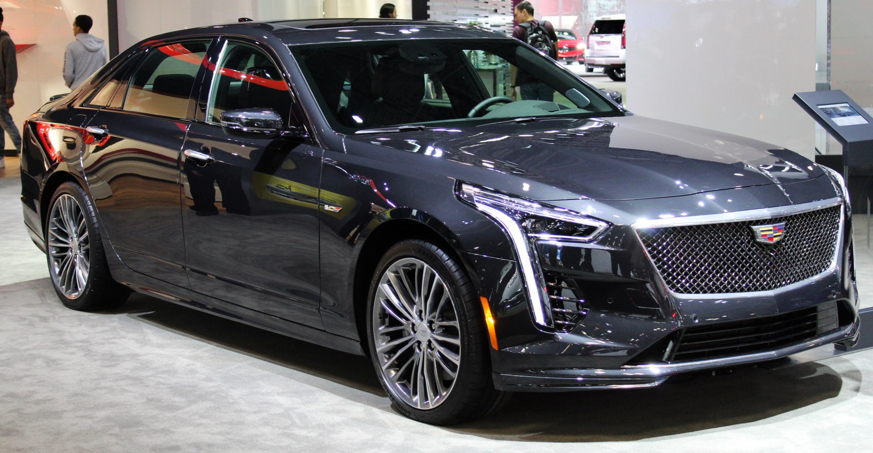 Luxury sedan with mesh grille and LED headlights