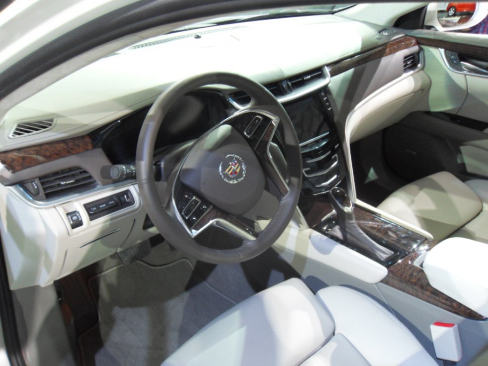 Leather interior and advanced steering wheel with wood trim