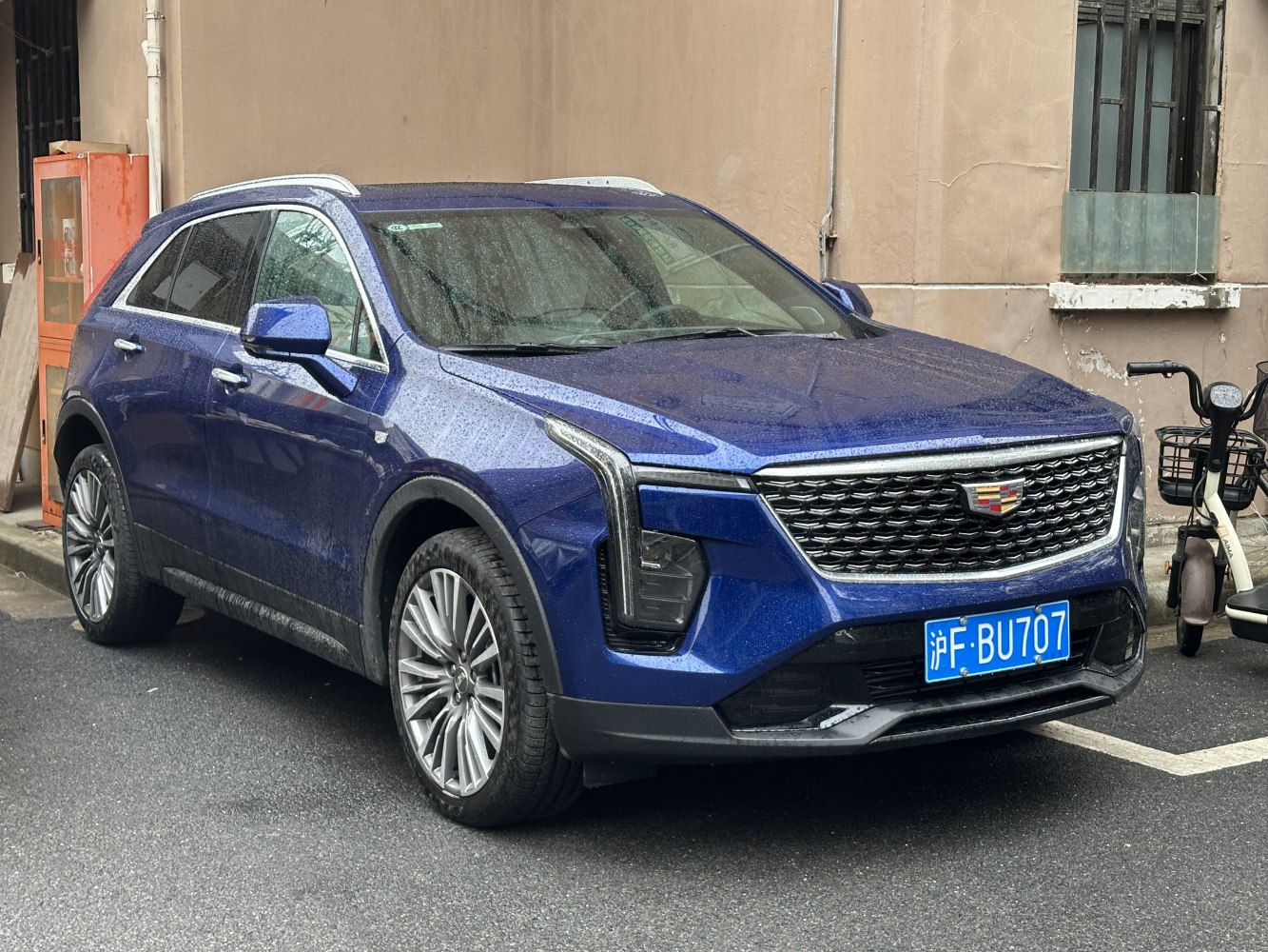 Front view with distinctive grille and vertical LED headlights