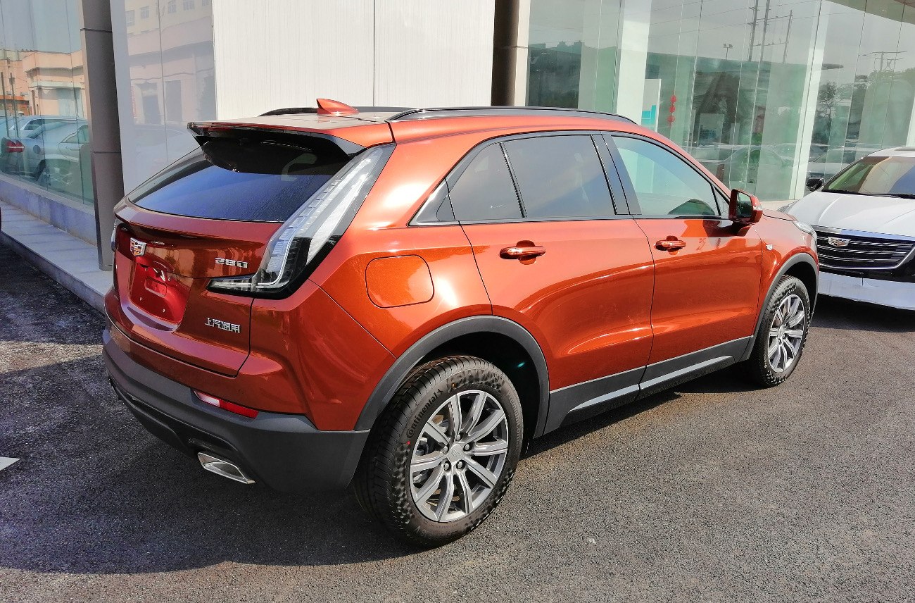 Modern luxury SUV rear side with LED taillights and alloy wheels