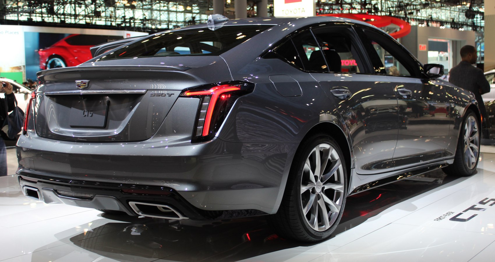 Rear view with LED vertical tail lights and sporty dual exhaust.