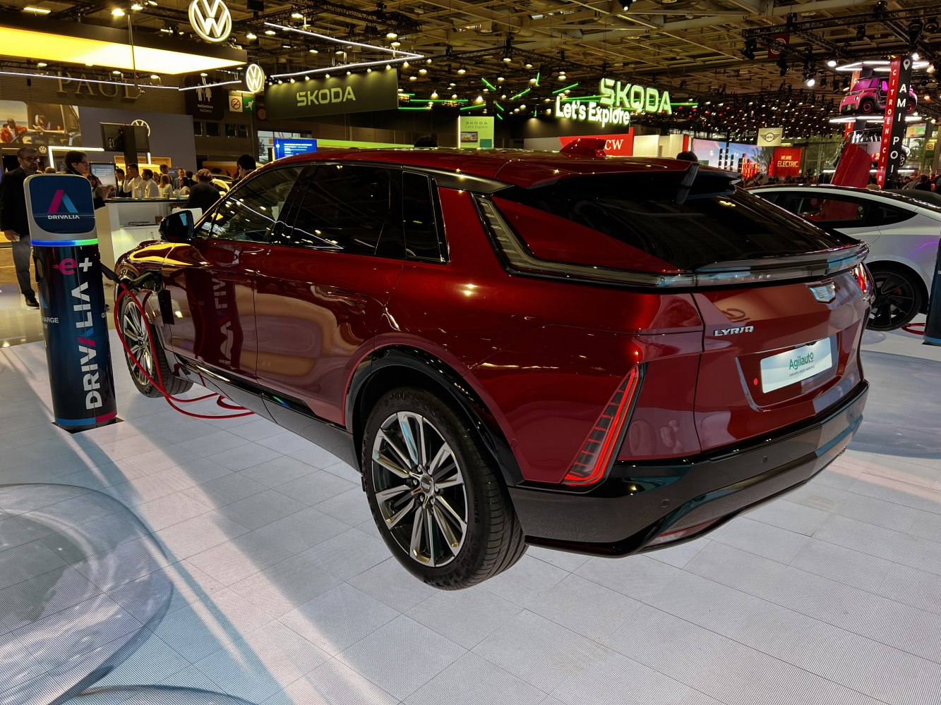 Rear view of electric SUV with charging port and aerodynamic design