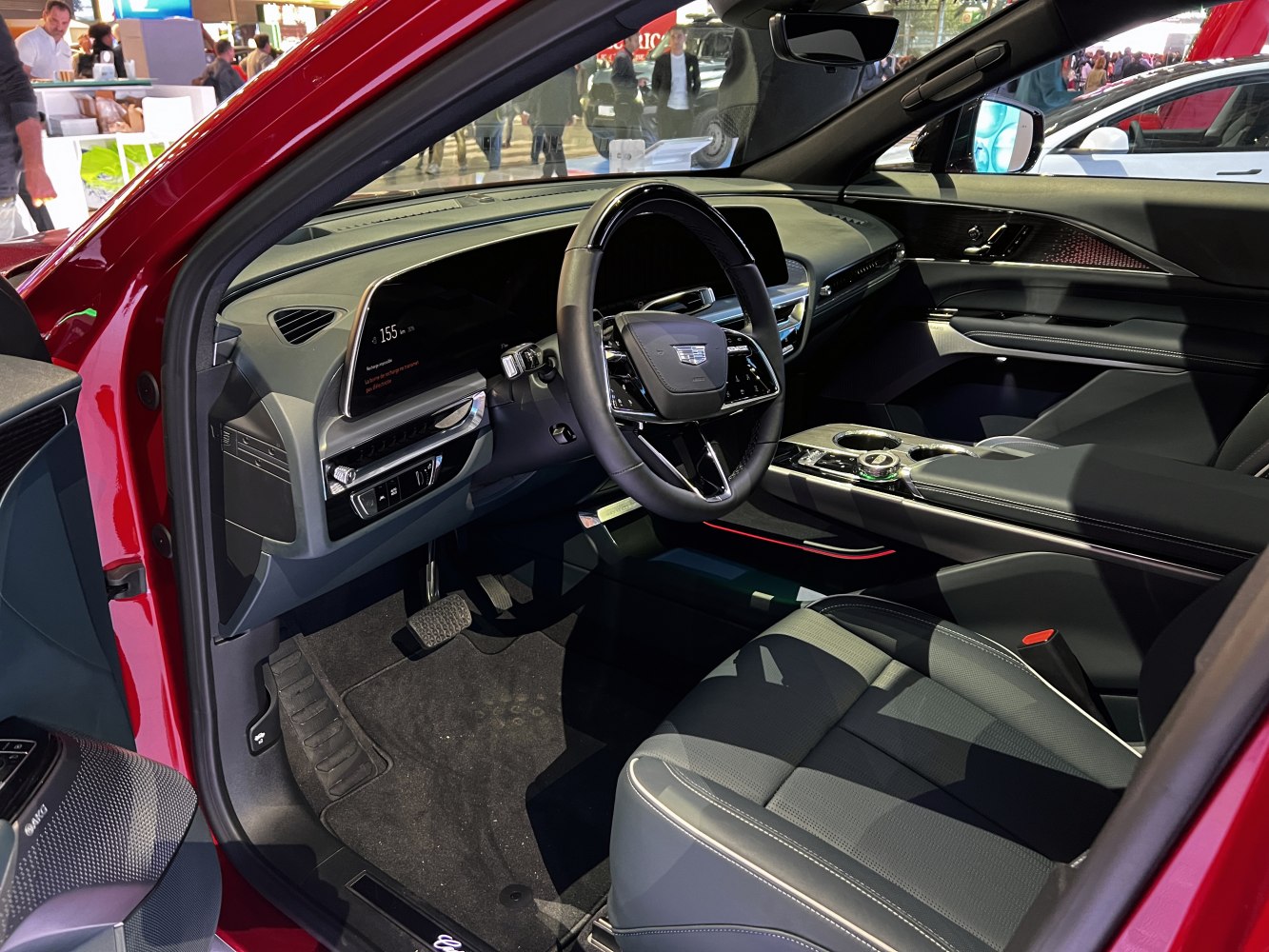 Luxurious digital dashboard and steering wheel with premium seating.