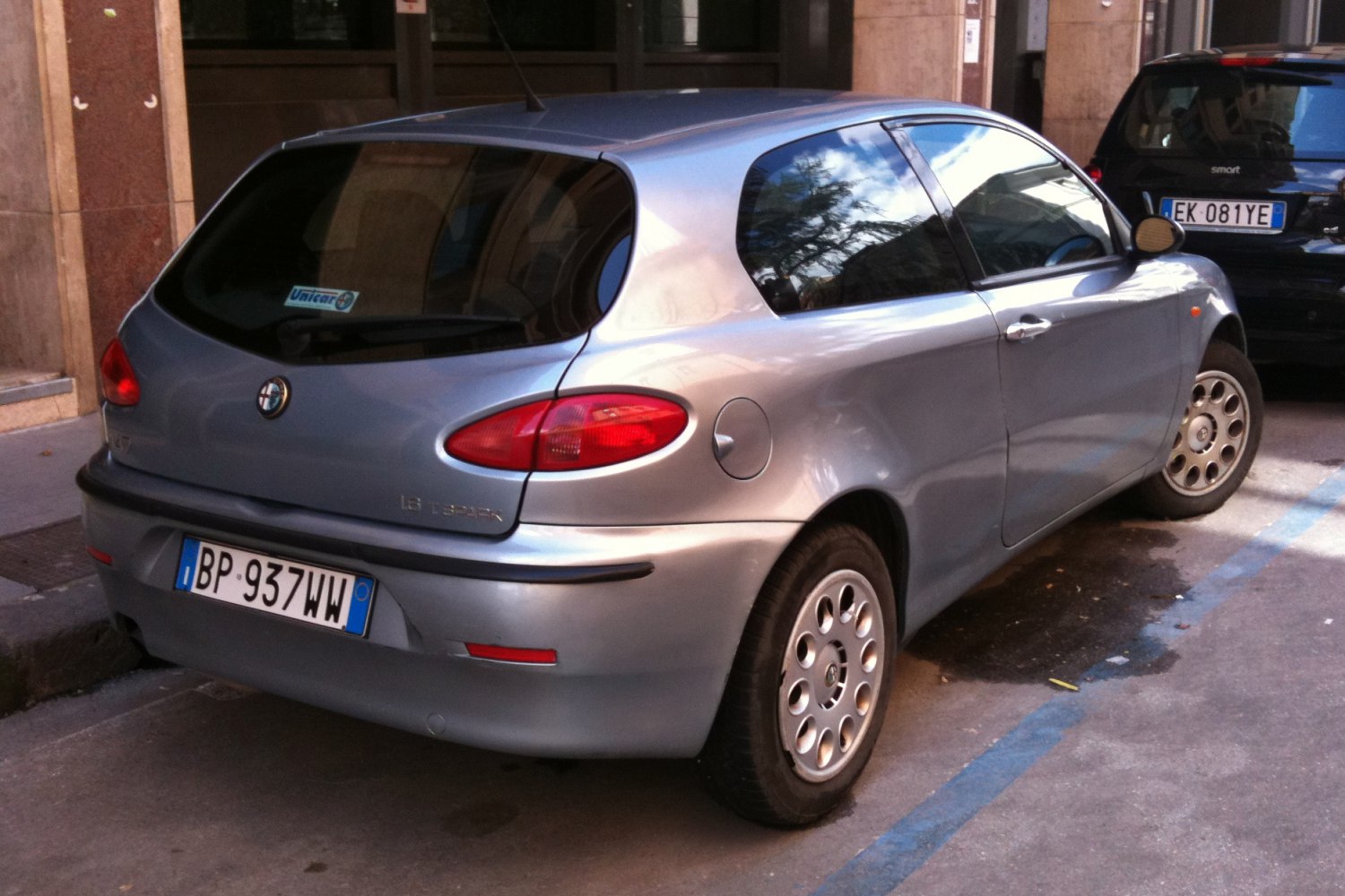 Rear and side view of 3-door hatchback with rounded tail lights and smooth body contours