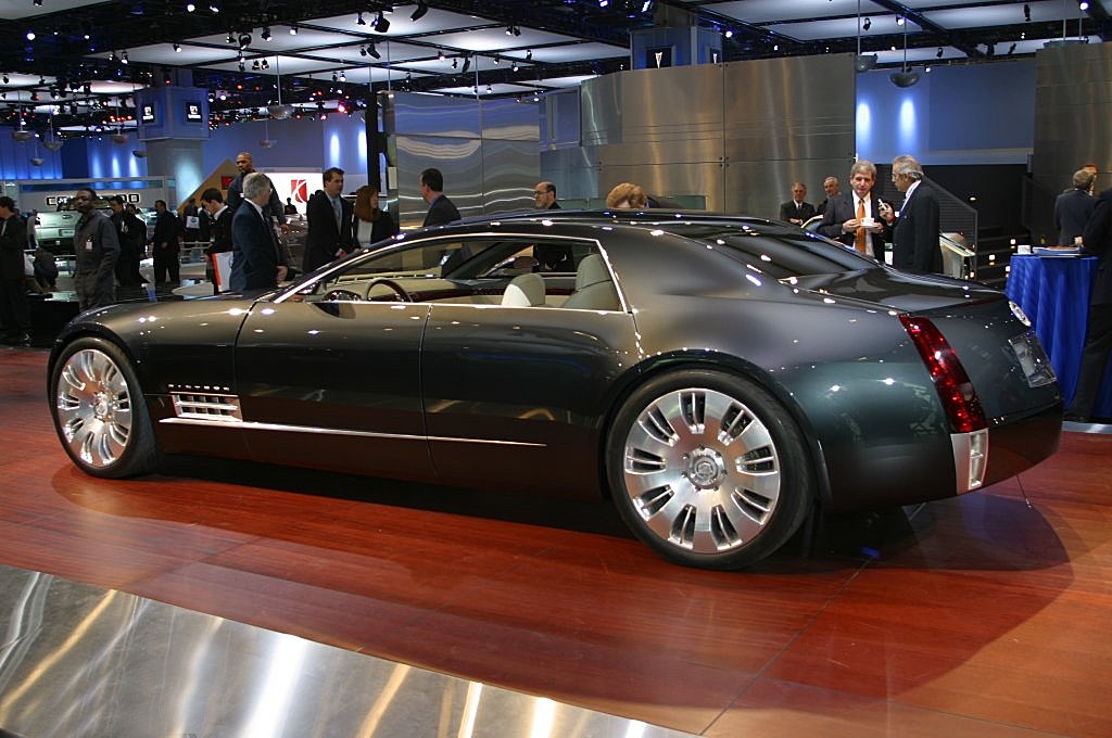 Sleek luxury coupe with long wheelbase and large alloy wheels